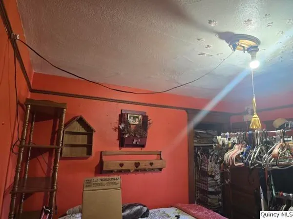 a room with lots of different colored cloths