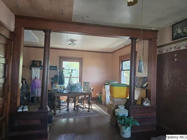 a living room with furniture and a window
