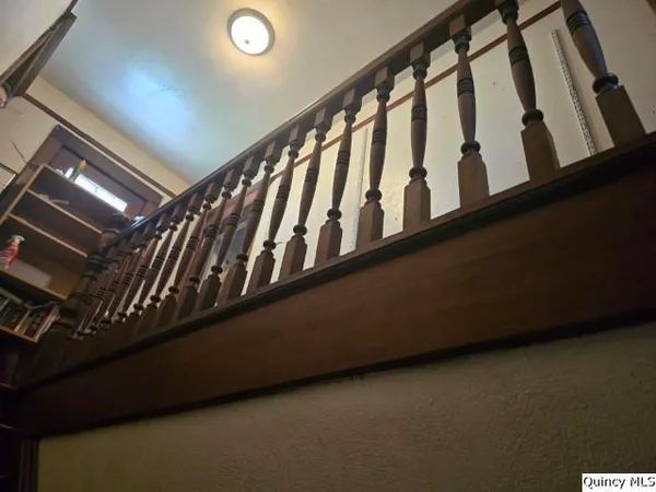 a black and white view of staircase
