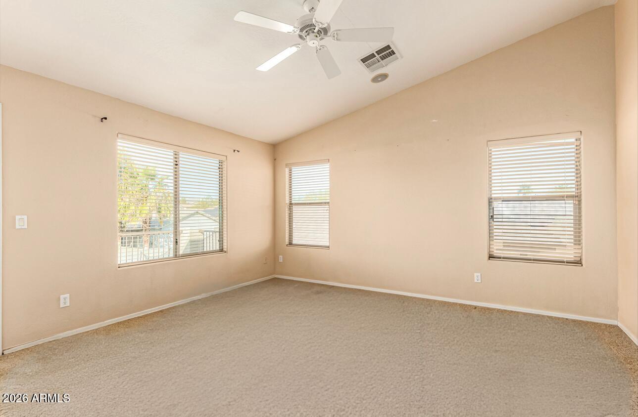 25660 West Dunlap Road Buckeye, AZ 85326 - Photo 18 of 40 a view of an empty room with a window