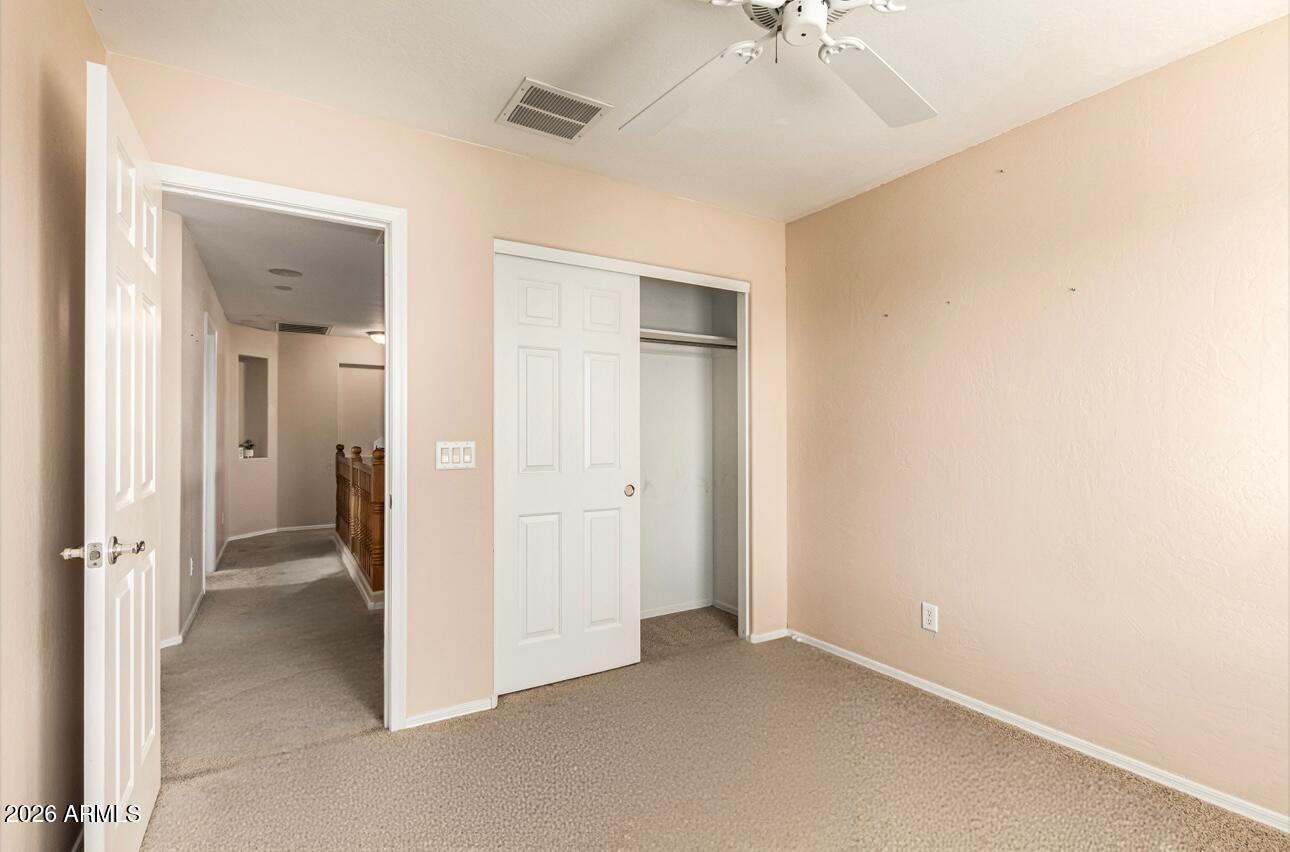 25660 West Dunlap Road Buckeye, AZ 85326 - Photo 26 of 40 wooden floor in an empty room