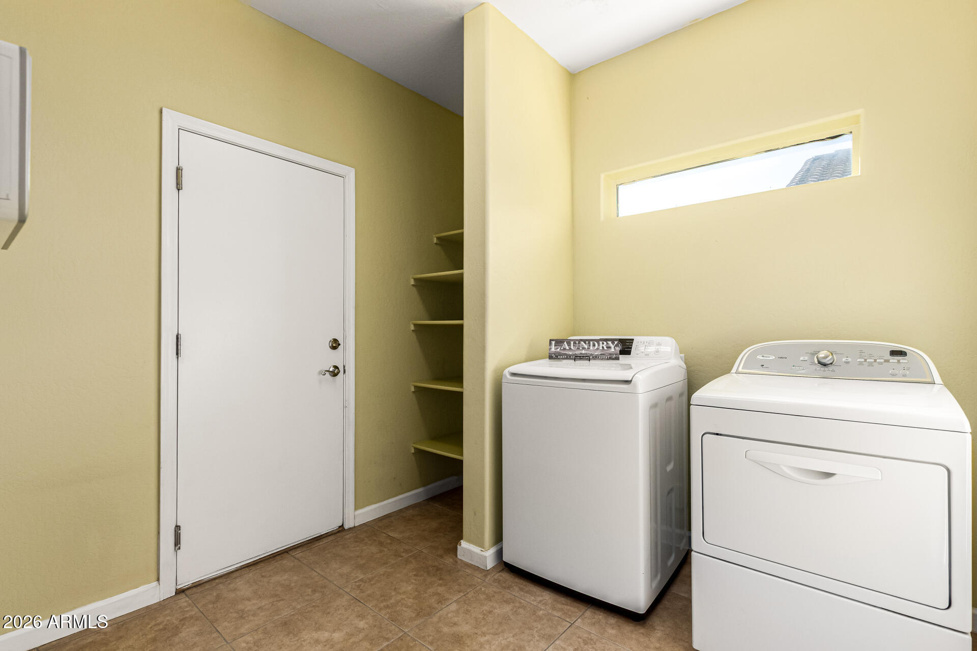 25660 West Dunlap Road Buckeye, AZ 85326 - Photo 32 of 40 a utility room with dryer and washer