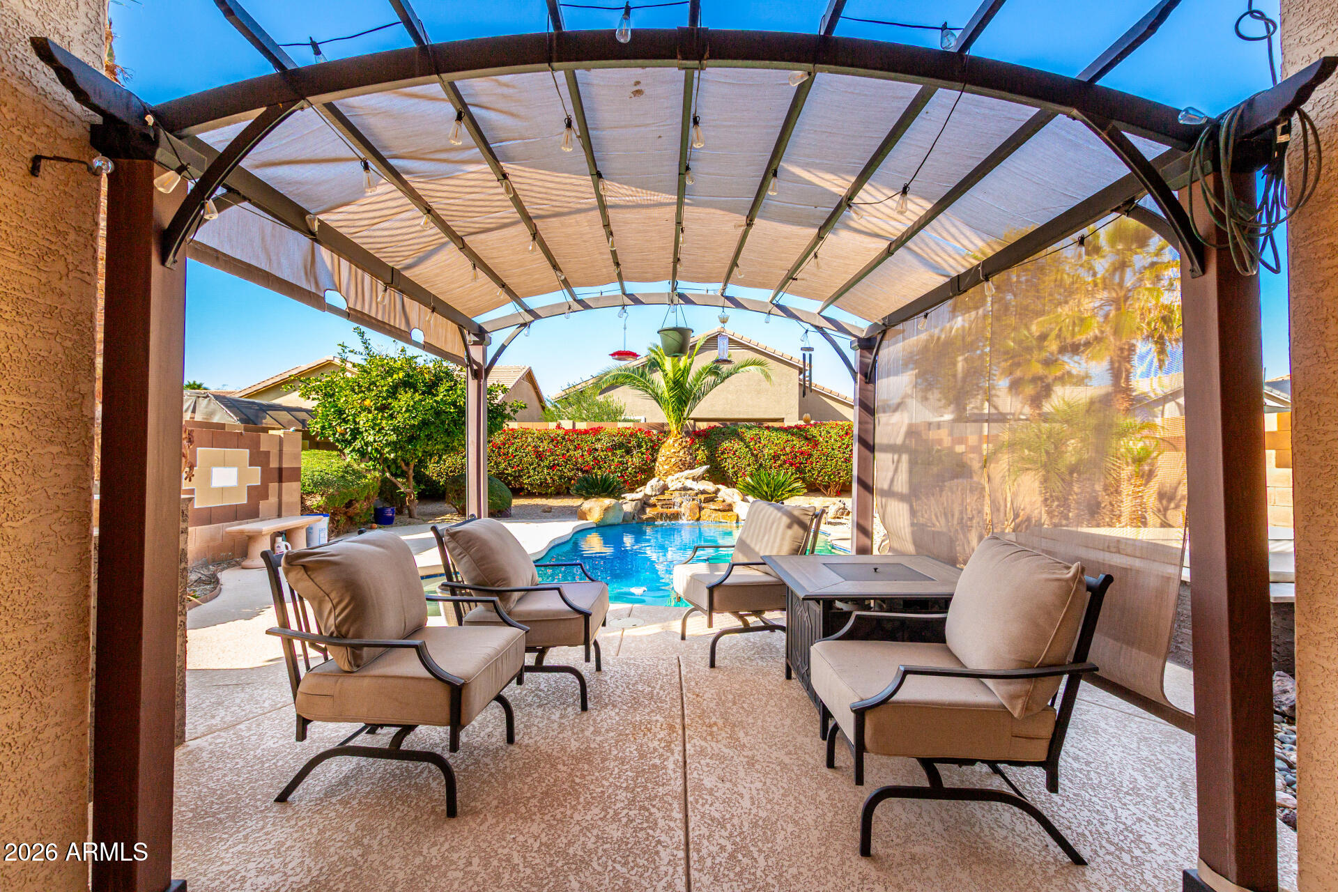 25660 West Dunlap Road Buckeye, AZ 85326 - Photo 35 of 40 a view of a porch with furniture and a yard