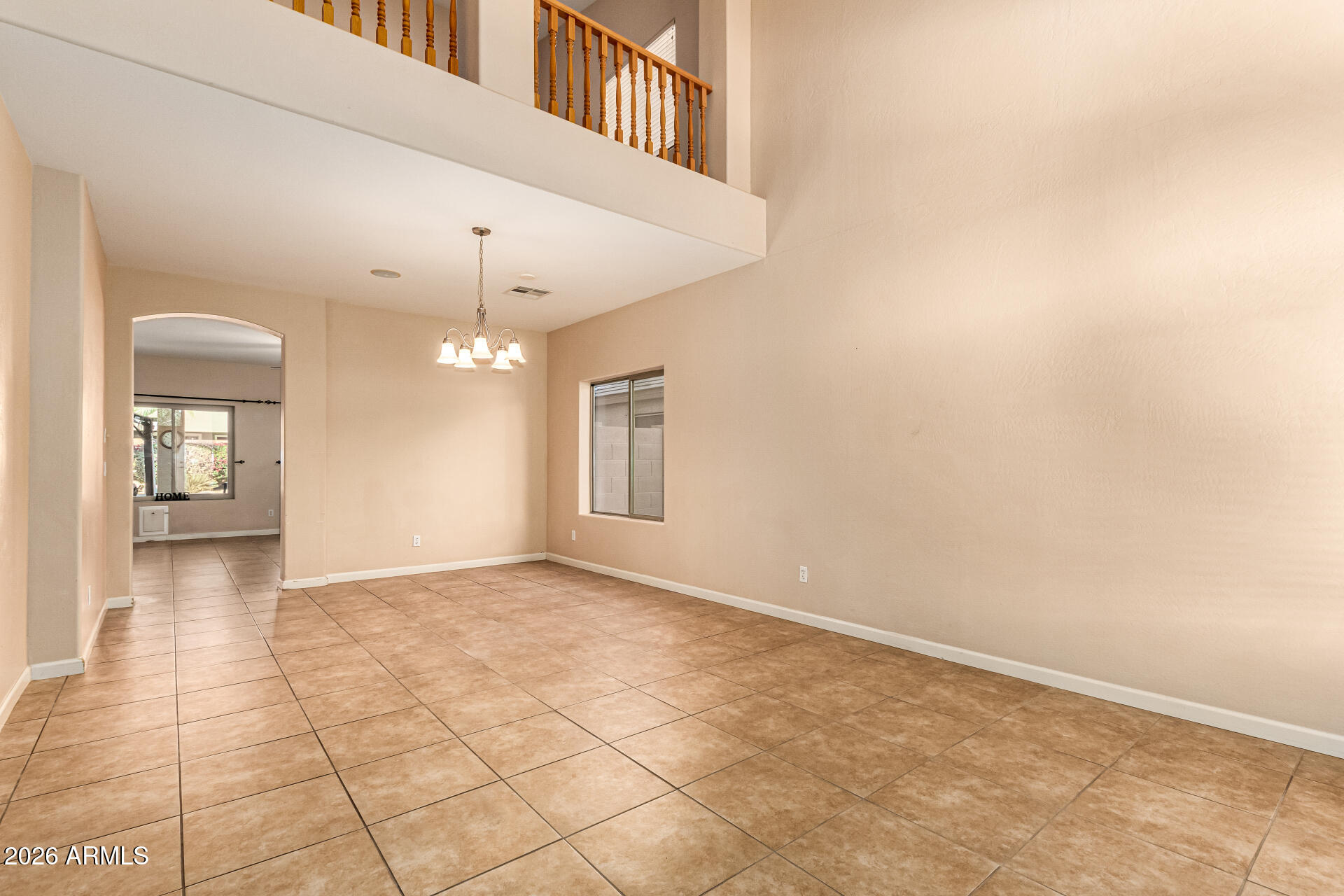 25660 West Dunlap Road Buckeye, AZ 85326 - Photo 4 of 40 a view of an empty room with a window