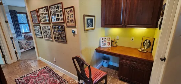 a room with furniture and wooden floor