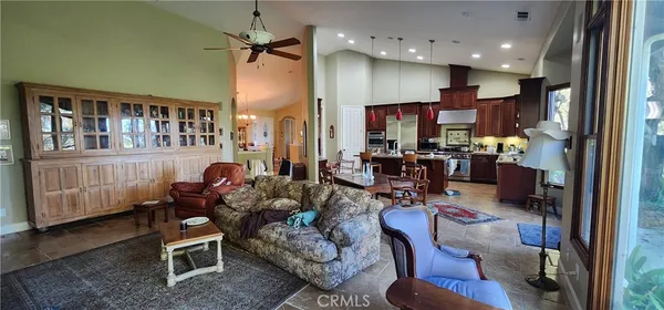 a room with furniture or outdoor and a kitchen