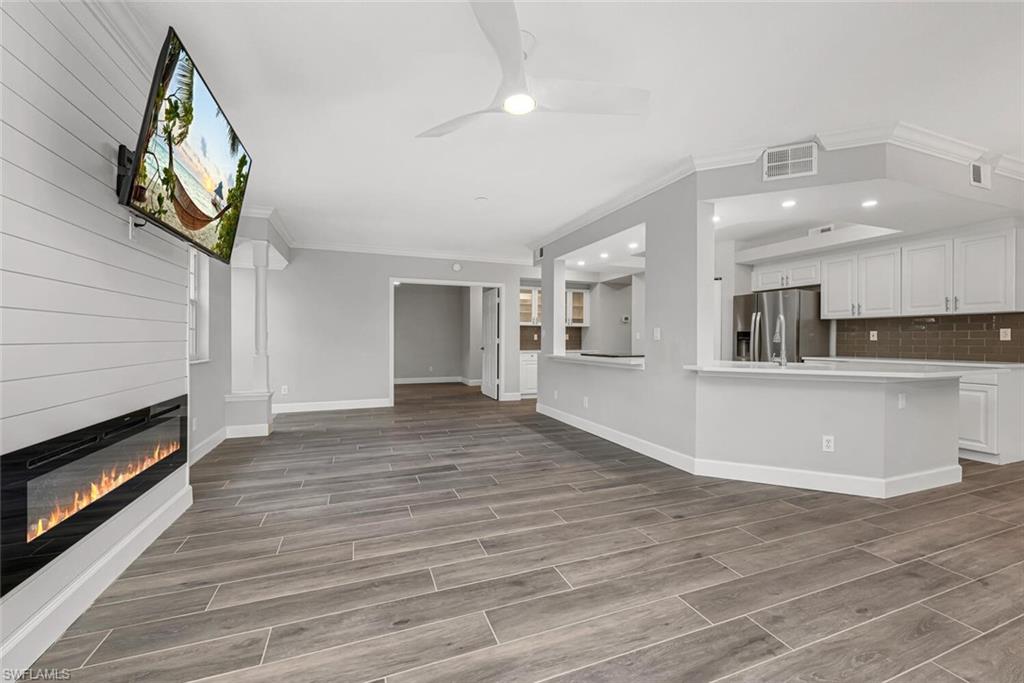 10771 Crooked River Road, Unit 103 Estero, FL 34135 - Photo 4 of 21 a view of kitchen and microwave