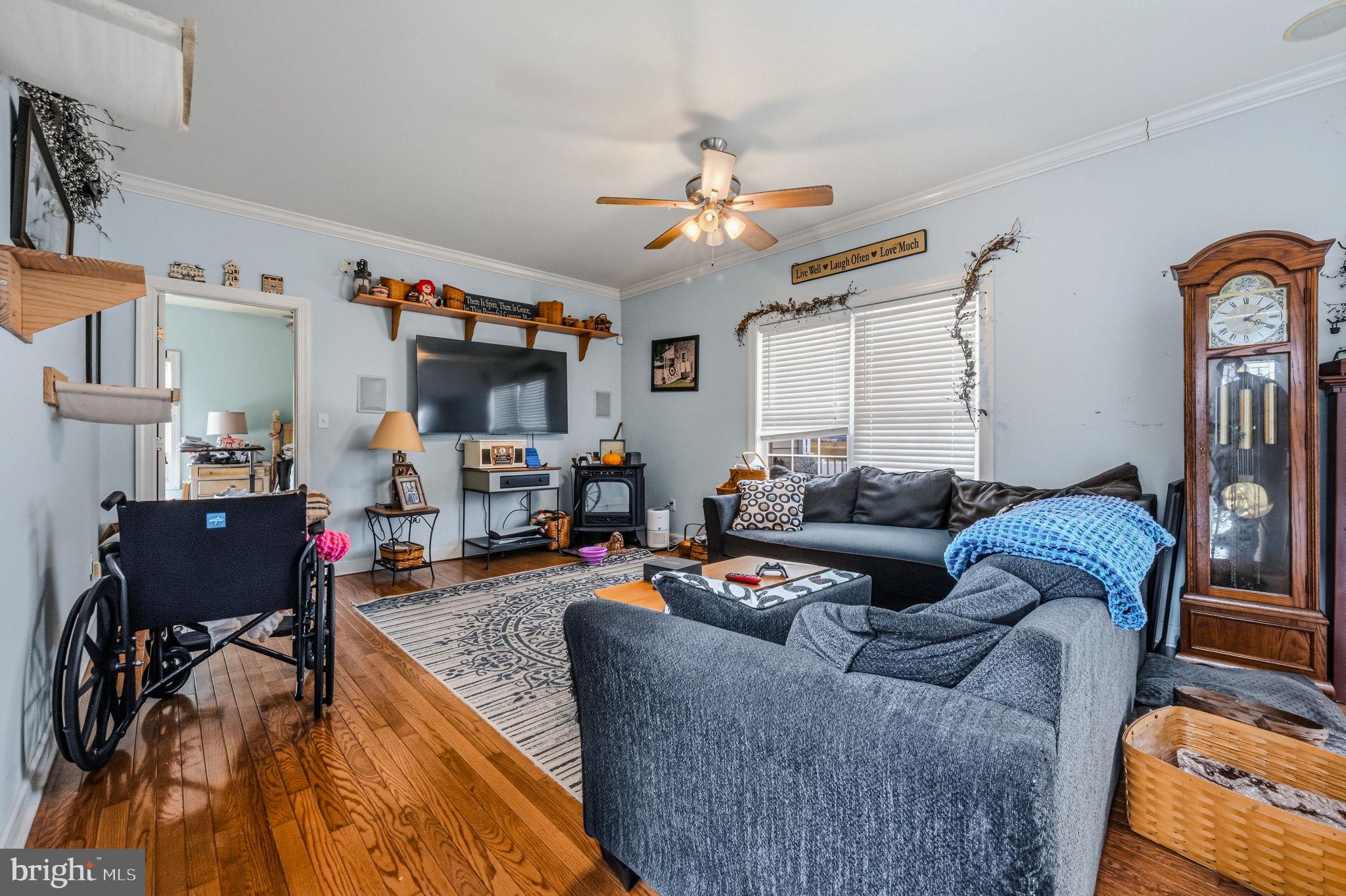 31536 Jestice Farm Road Laurel, DE 19956 - Photo 18 of 35 a living room with furniture and a flat screen tv