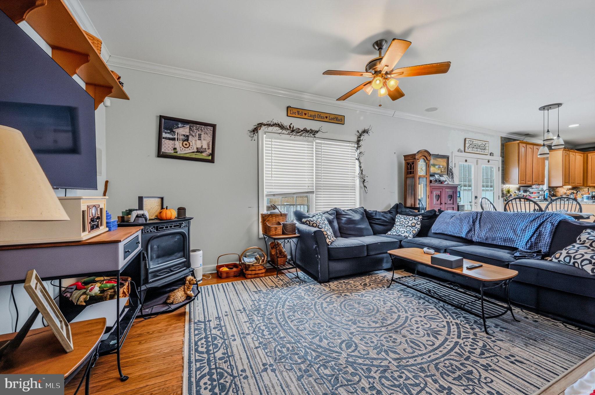 31536 Jestice Farm Road Laurel, DE 19956 - Photo 19 of 35 a living room with furniture and a wooden floor
