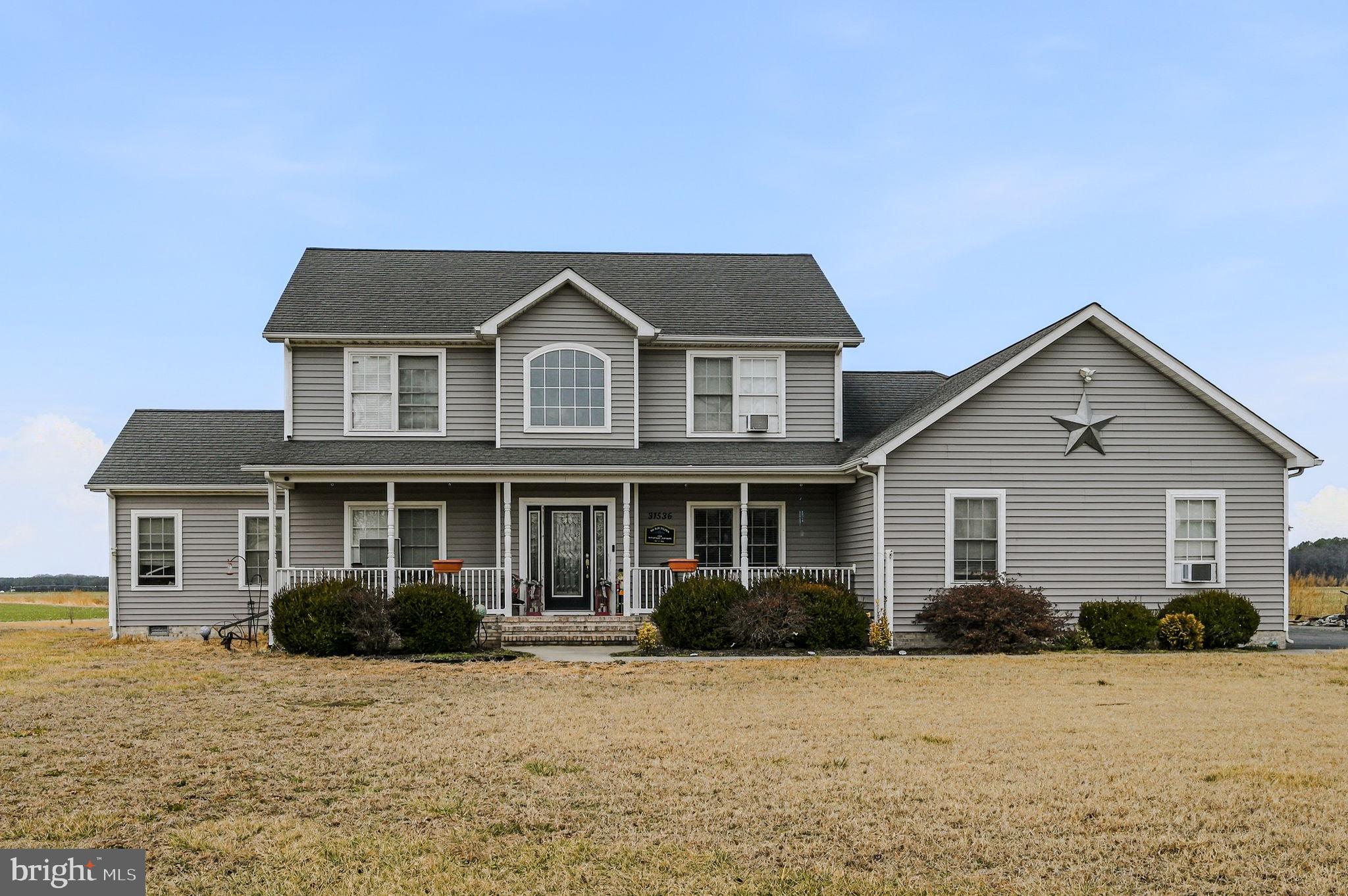31536 Jestice Farm Road Laurel, DE 19956 - Photo 3 of 35 front view of a house with a yard