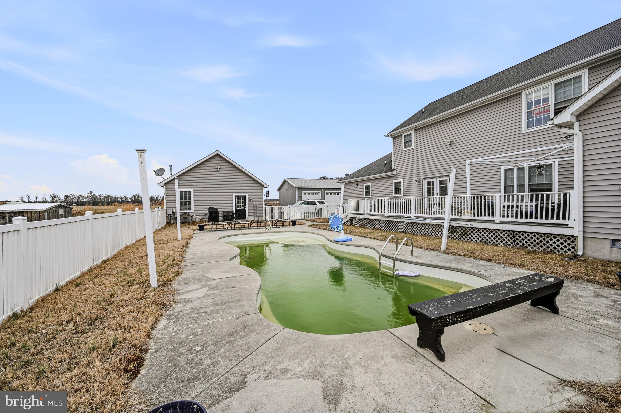 31536 Jestice Farm Road Laurel, DE 19956 - Photo 33 of 35 a view of a house with swimming pool and sitting area
