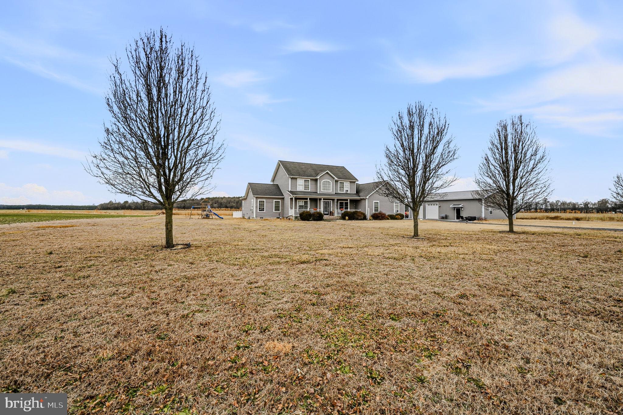 31536 Jestice Farm Road Laurel, DE 19956 - Photo 5 of 35 a view of a yard with a house