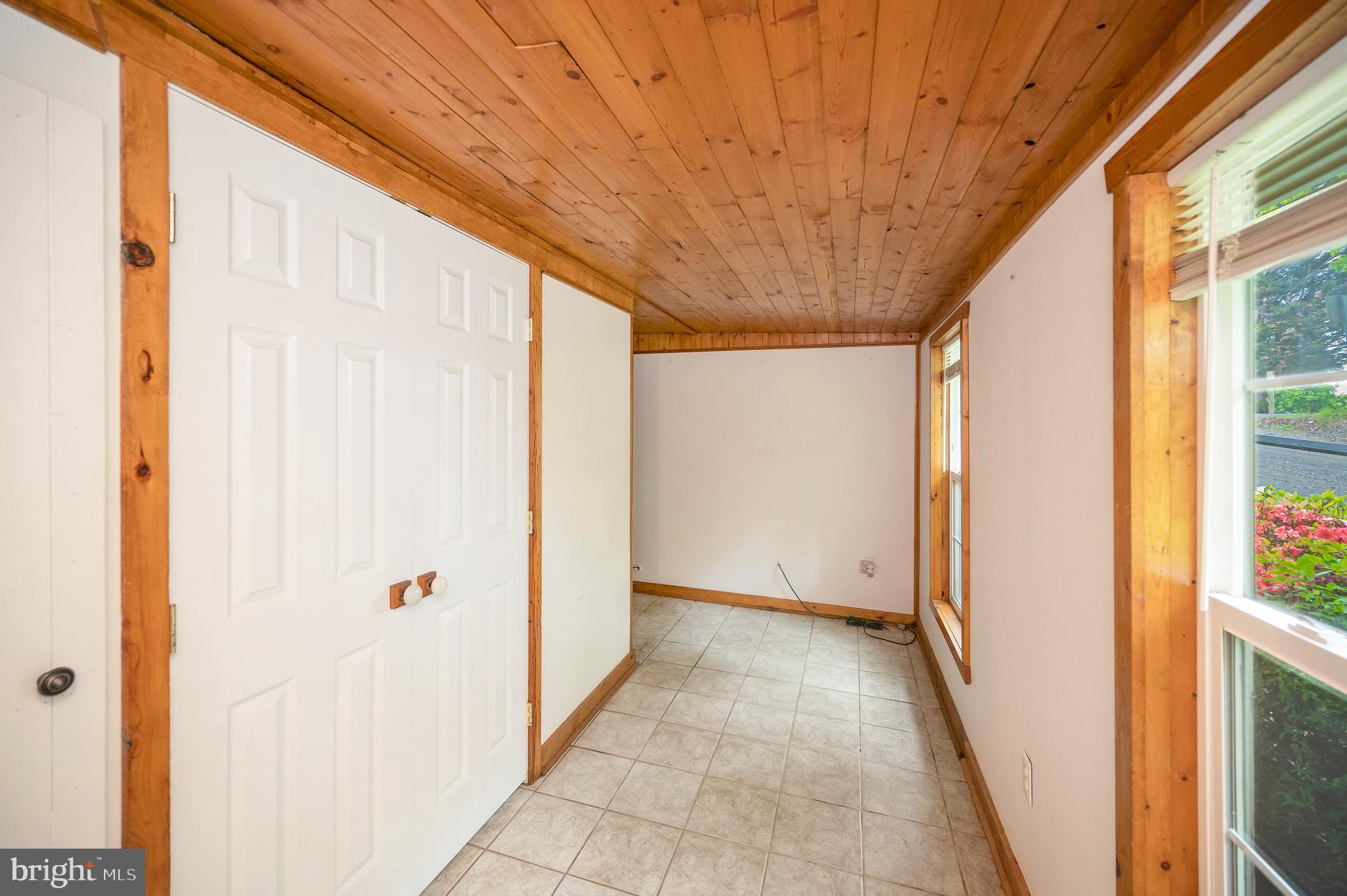7007 Signal Hill Road Manassas, VA 20111 - Photo 6 of 45 Walk in to a massive mudroom with tile and storage
