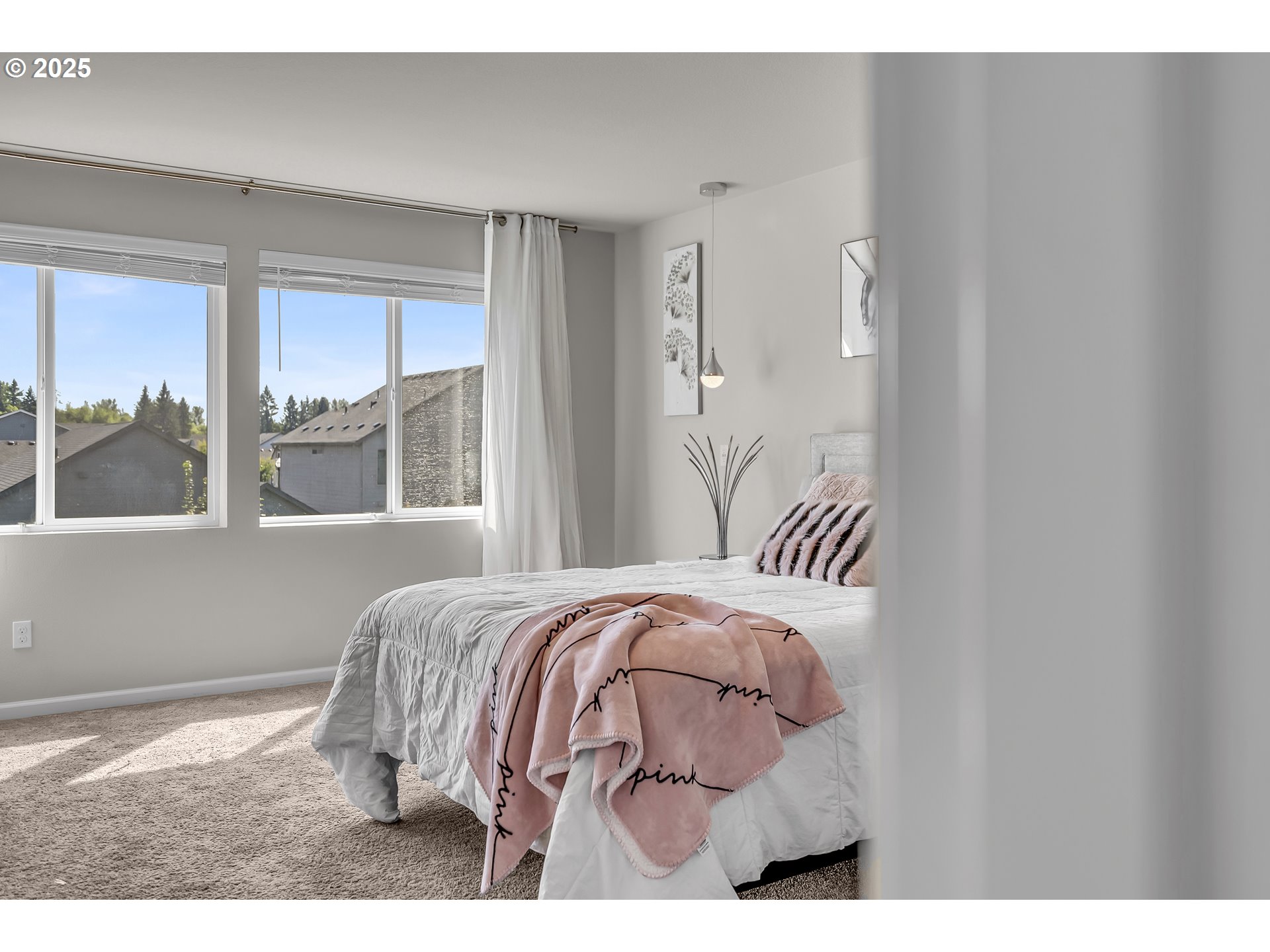 13305 Northeast 114th Way Brush Prairie, WA 98606 - Photo 20 of 40 a bedroom with a bed and a large window