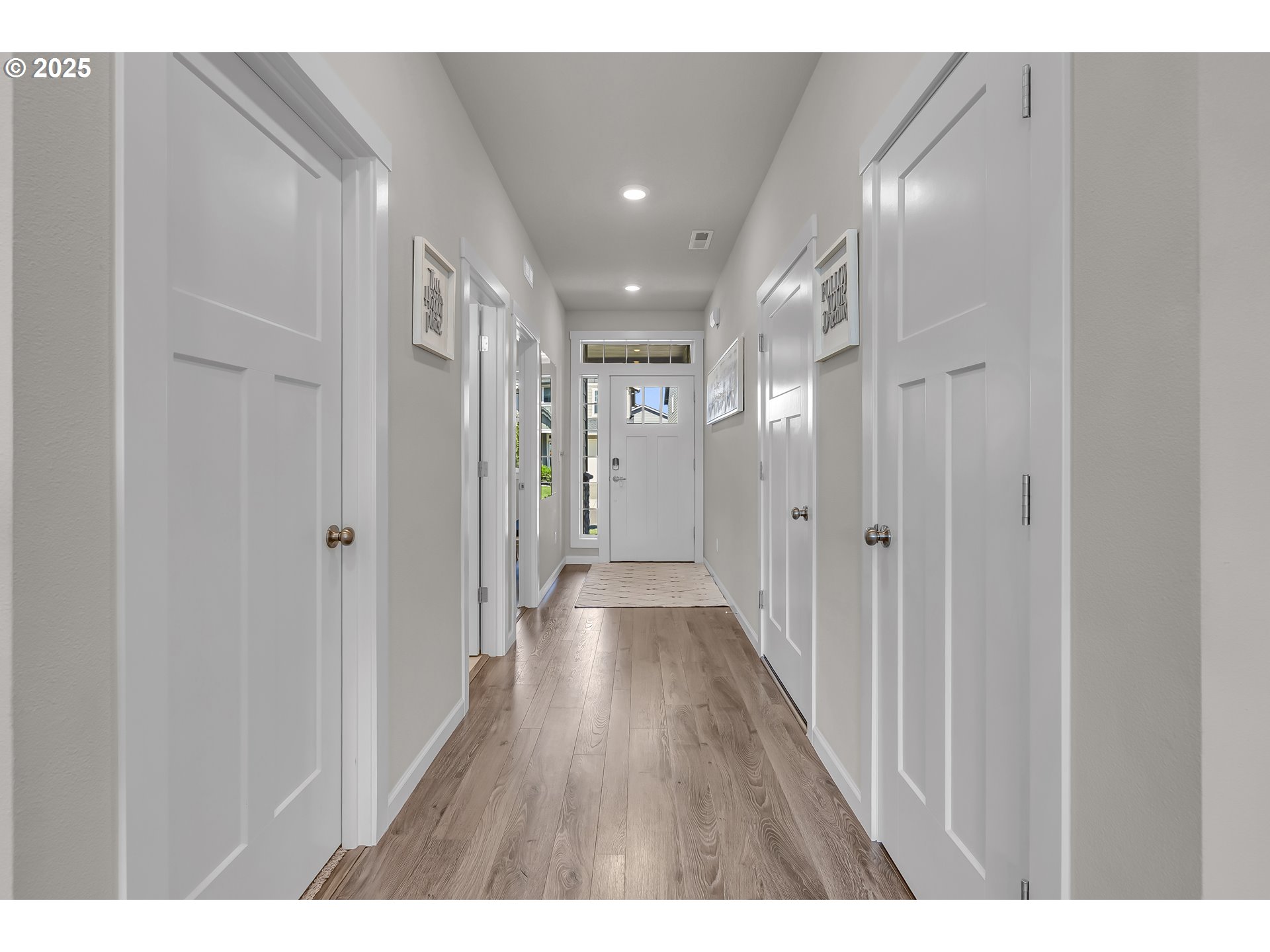 13305 Northeast 114th Way Brush Prairie, WA 98606 - Photo 7 of 40 a view of hallway with wooden floor