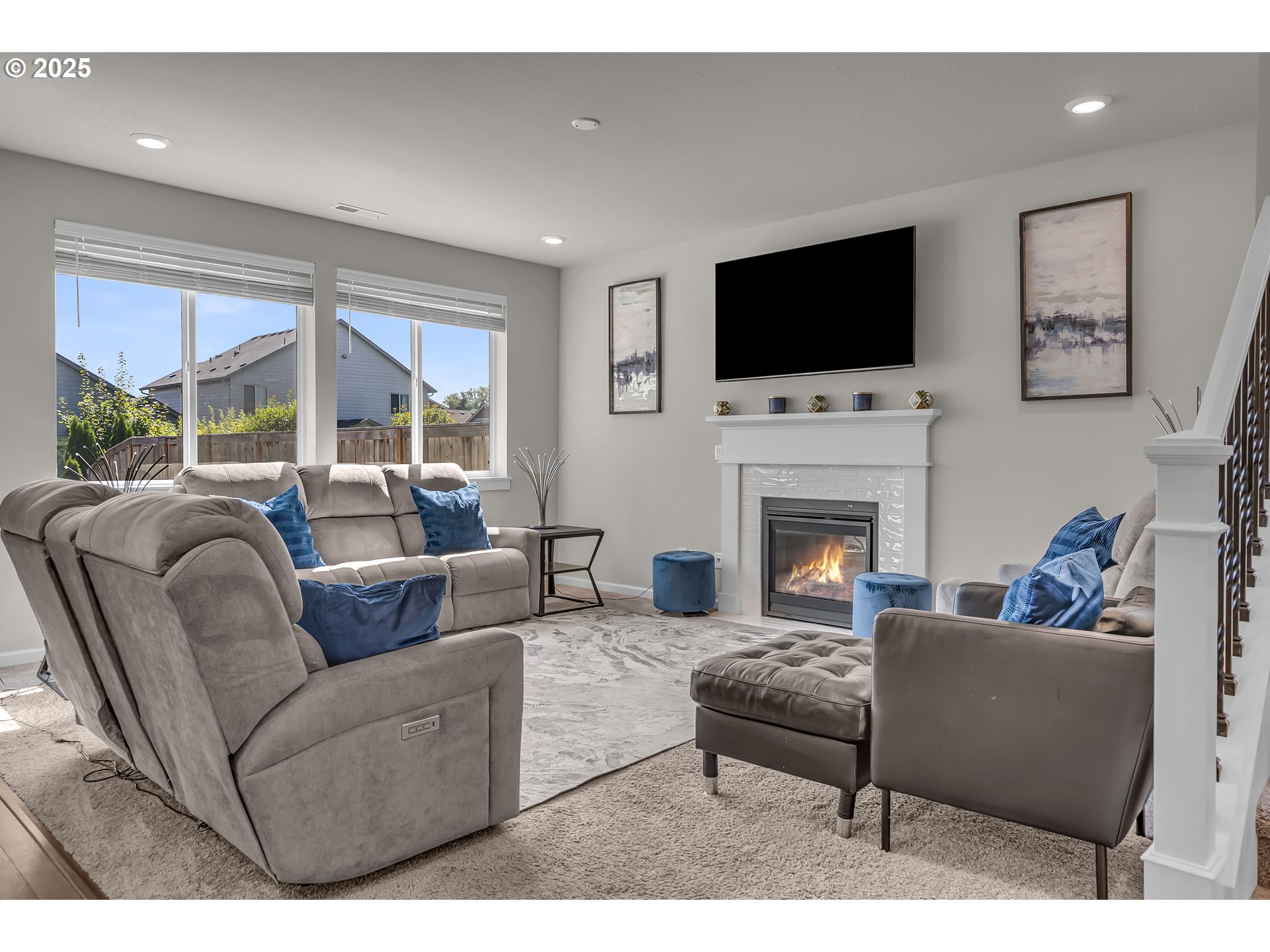 13305 Northeast 114th Way Brush Prairie, WA 98606 - Photo 9 of 40 a living room with furniture fireplace and a flat screen tv