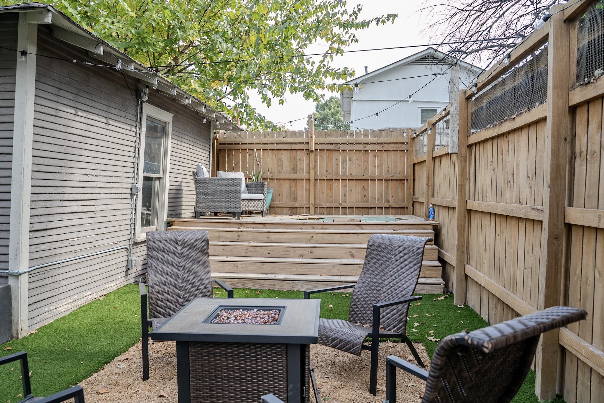 210 North Avalon Street Memphis, TN 38112 - Photo 23 of 30 View of patio with an outdoor fire pit and fence