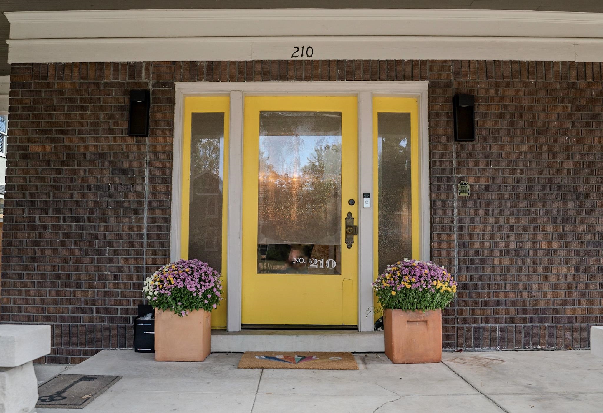 210 North Avalon Street Memphis, TN 38112 - Photo 29 of 30 Doorway to property featuring brick siding