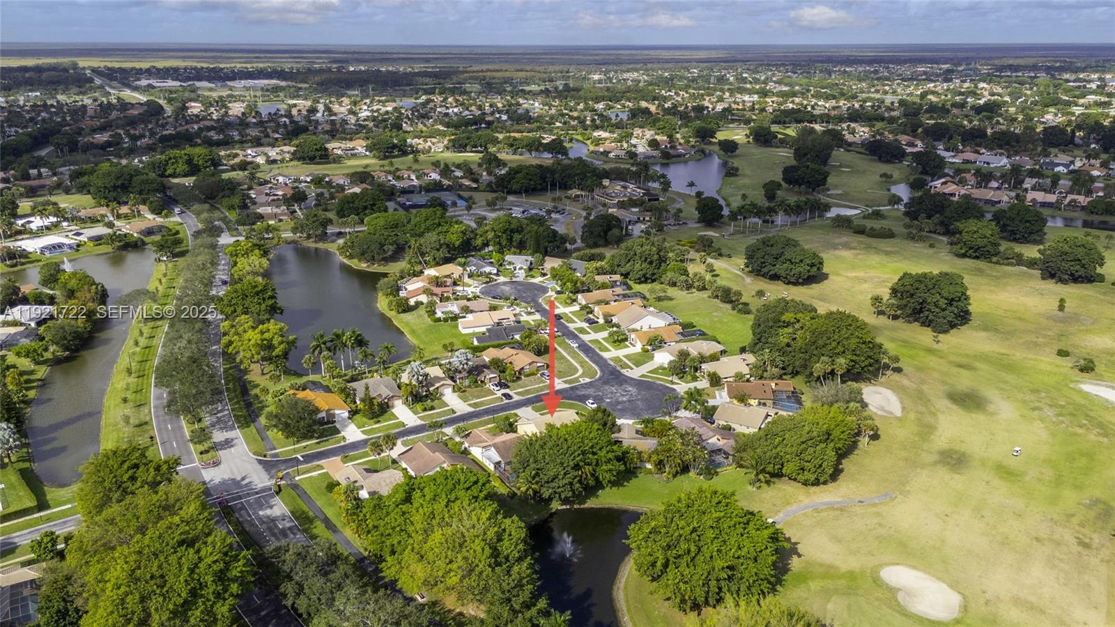 19648 Back 9 Drive, Unit 19648 Boca Raton, FL 33498 - Photo 29 of 39 an aerial view of residential houses with outdoor space