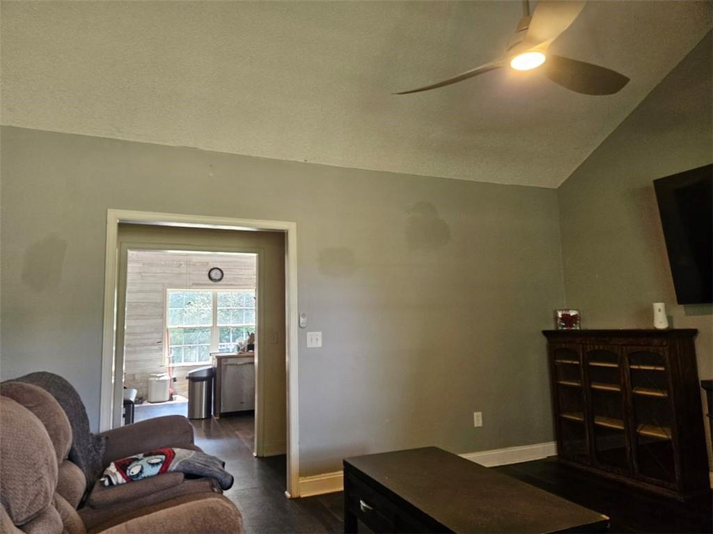 805 Gose Road Forsyth, GA 31029 - Photo 10 of 29 a living room with furniture and a flat screen tv