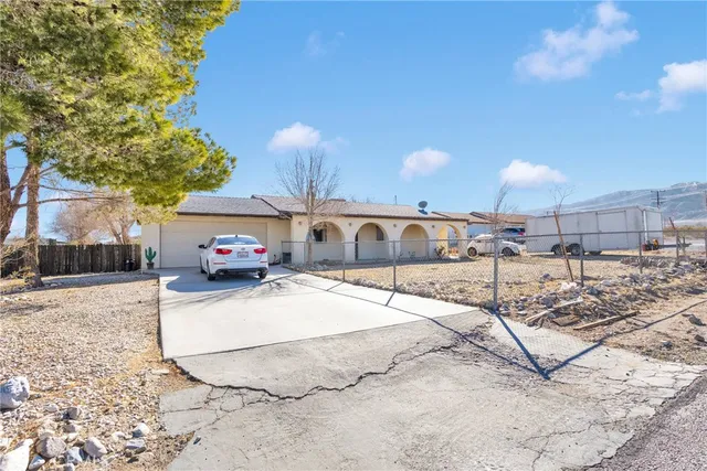 a view of a street with a cars on road