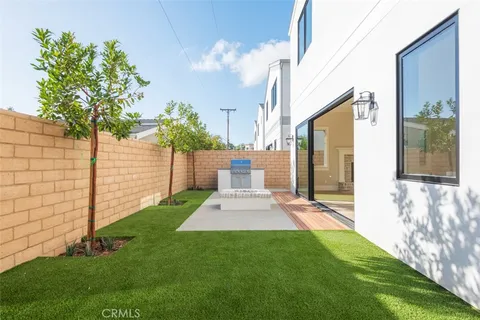 a view of a back yard of the house