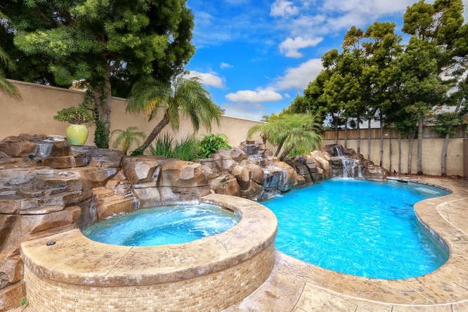 171 Monarch Bay Drive Dana Point, CA 92629 - Photo 12 of 12 a view of a swimming pool with a sitting space