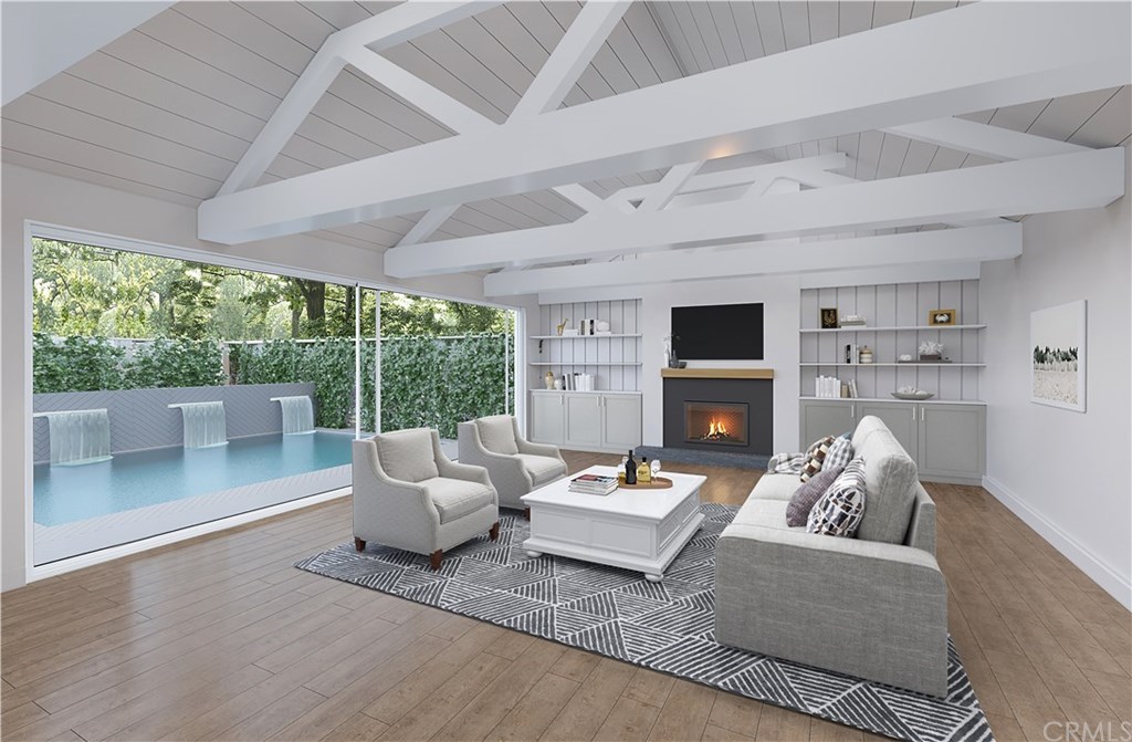 171 Monarch Bay Drive Dana Point, CA 92629 - Photo 4 of 12 a living room with furniture and a flat screen tv