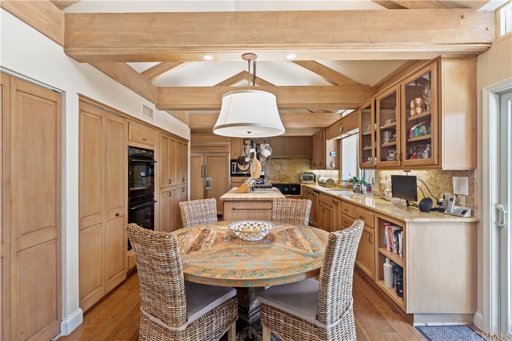 171 Monarch Bay Drive Dana Point, CA 92629 - Photo 6 of 12 a view of a dining room with furniture and chandelier