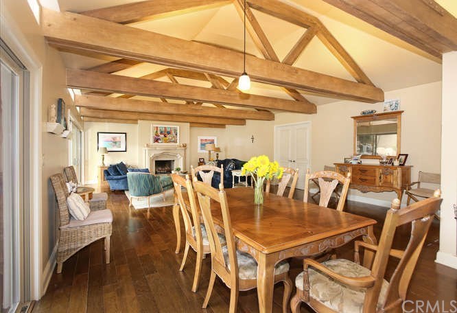 171 Monarch Bay Drive Dana Point, CA 92629 - Photo 8 of 12 a dining room with furniture and wooden floor