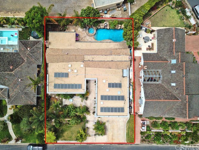 171 Monarch Bay Drive Dana Point, CA 92629 - Photo 9 of 12 an aerial view of a house with a yard and potted plants