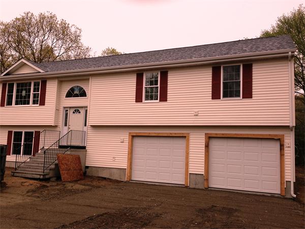 13 Bullock Road Freetown, MA 02717 - Photo 3 of 4 a front view of a house with a yard