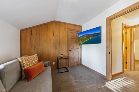 a view of room with furniture and a window