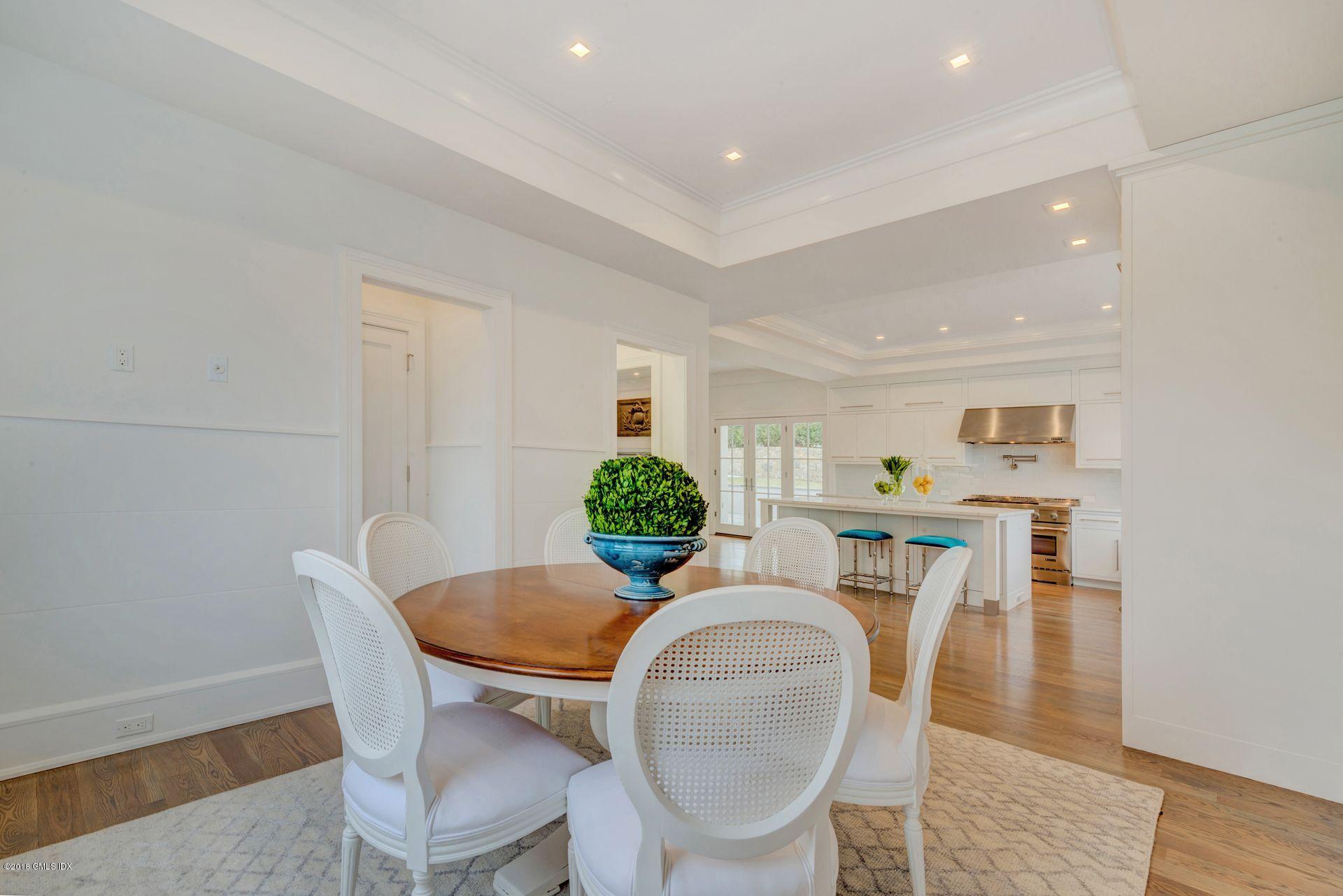 10 Lakeview Drive Riverside, CT 06878 - Photo 7 of 28 a dining room with furniture and wooden floor
