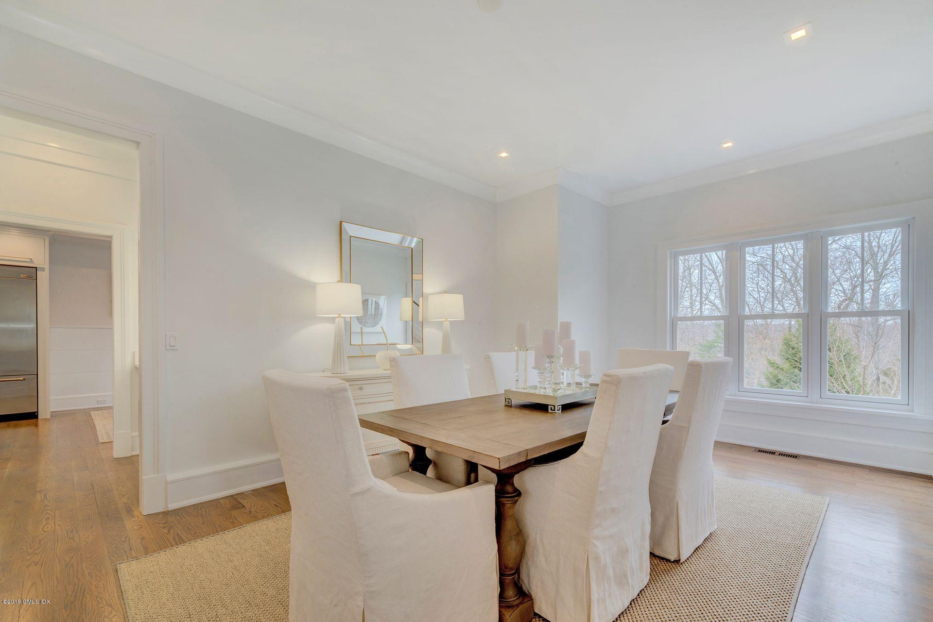 10 Lakeview Drive Riverside, CT 06878 - Photo 8 of 28 a view of a dining room with furniture and wooden floor