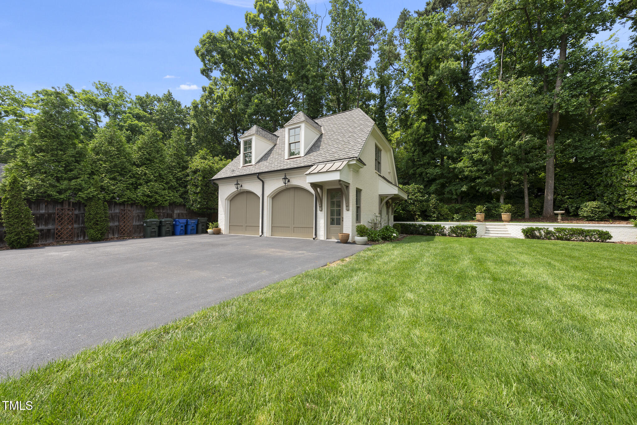504 Yarmouth Road Raleigh, NC 27608 - Photo 67 of 92 a front view of a house with a yard