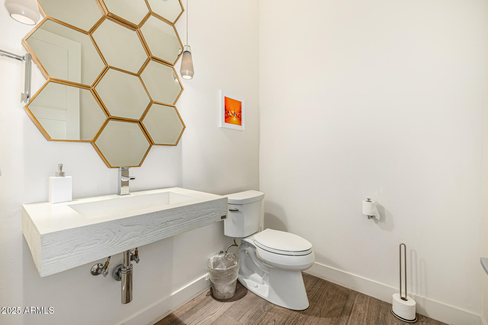 4535 North 49th Place Phoenix, AZ 85018 - Photo 38 of 75 a bathroom with a sink and a mirror