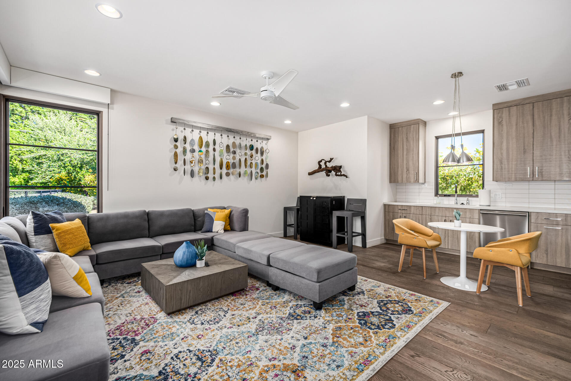 4535 North 49th Place Phoenix, AZ 85018 - Photo 53 of 75 a living room with furniture rug and window