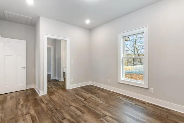 a view of an empty room and window