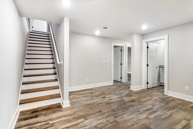 a view of a backyard of the house