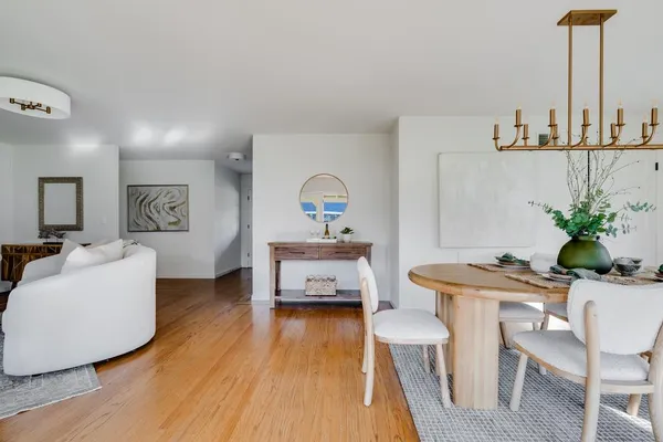 a kitchen with a sink cabinets and window