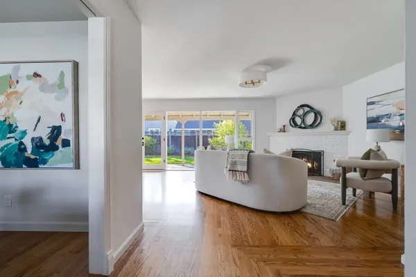 a kitchen with stainless steel appliances granite countertop a stove and a refrigerator