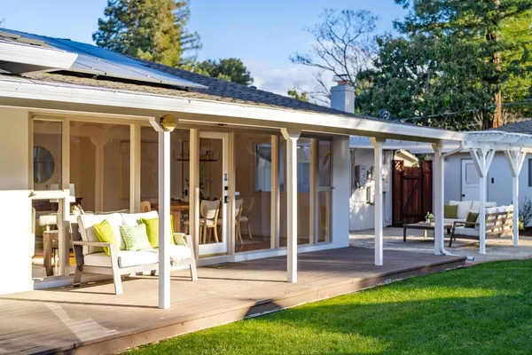 a view of a patio with furniture