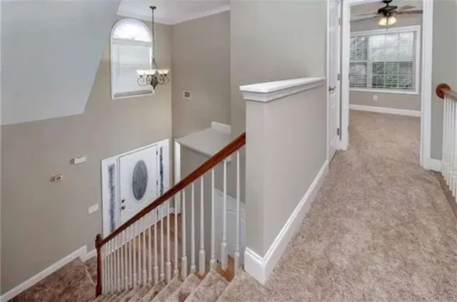 a view of a hallway with windows