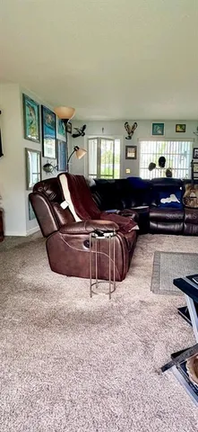 a bed room with furniture and gym equipment
