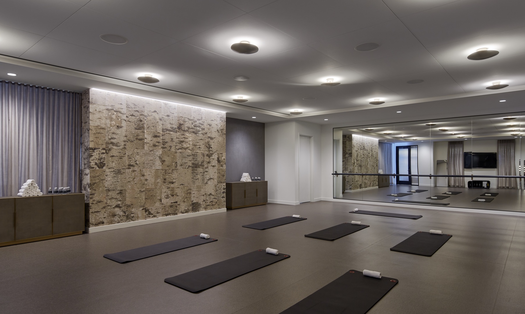 211 North Harbor Drive, Unit 1107 Chicago, IL 60601 - Photo 13 of 25 a room with gym equipment and a large window