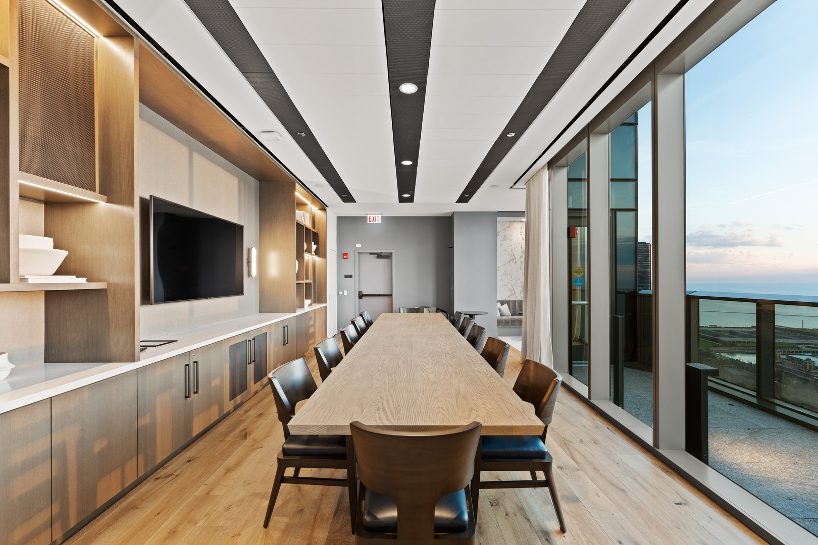 211 North Harbor Drive, Unit 1107 Chicago, IL 60601 - Photo 22 of 25 a view of a dining room with furniture window and wooden floor