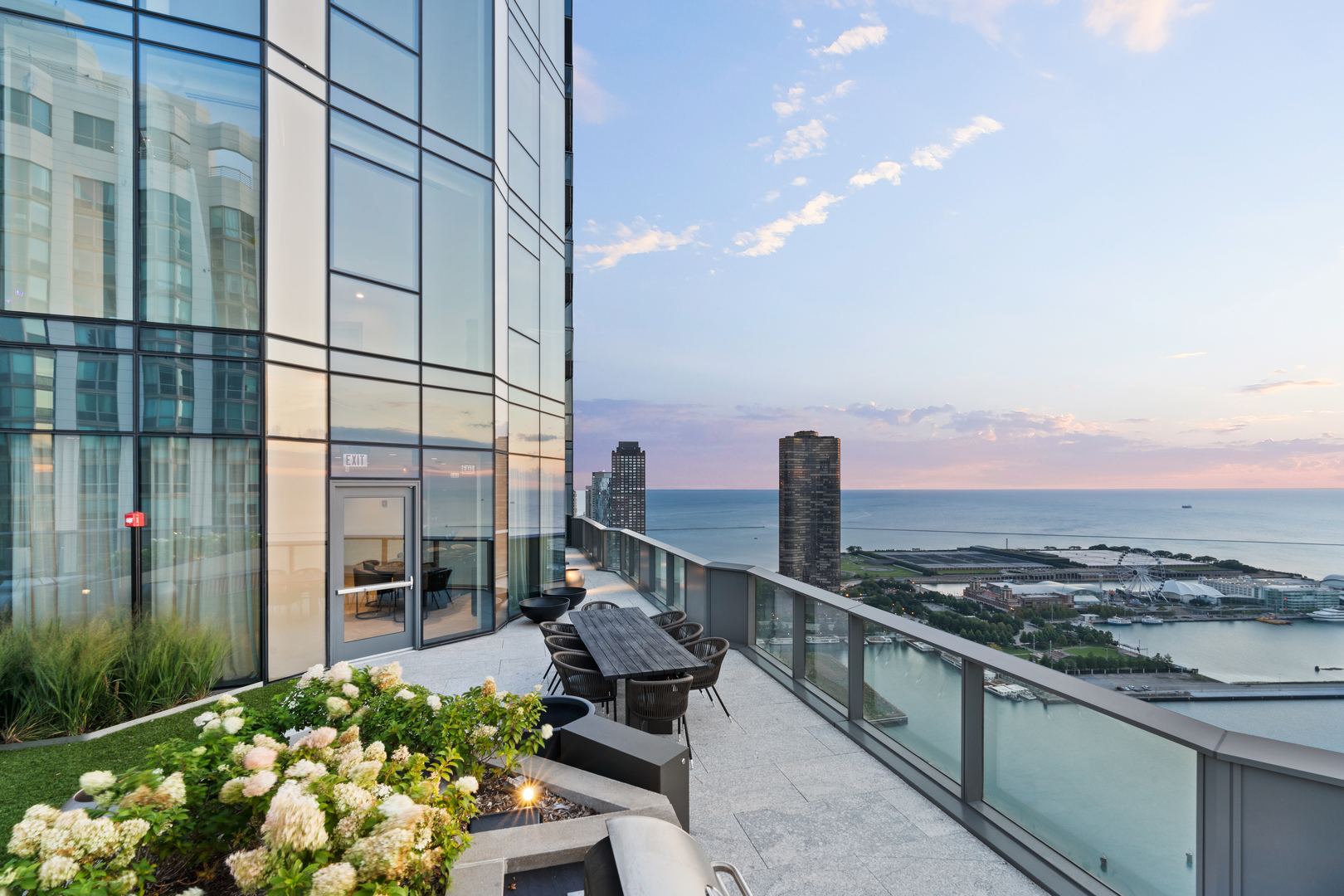 211 North Harbor Drive, Unit 1107 Chicago, IL 60601 - Photo 24 of 25 a city view with tall buildings and ocean view