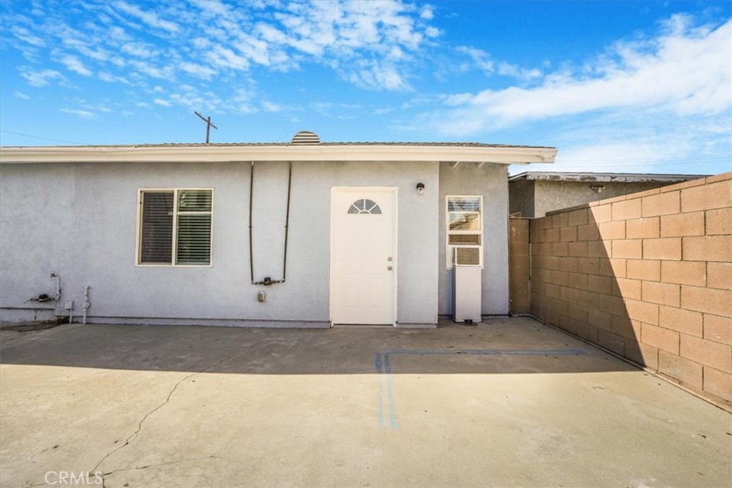 13737 Mercer Street Pacoima, CA 91331 - Photo 21 of 35 a front view of a house with garage