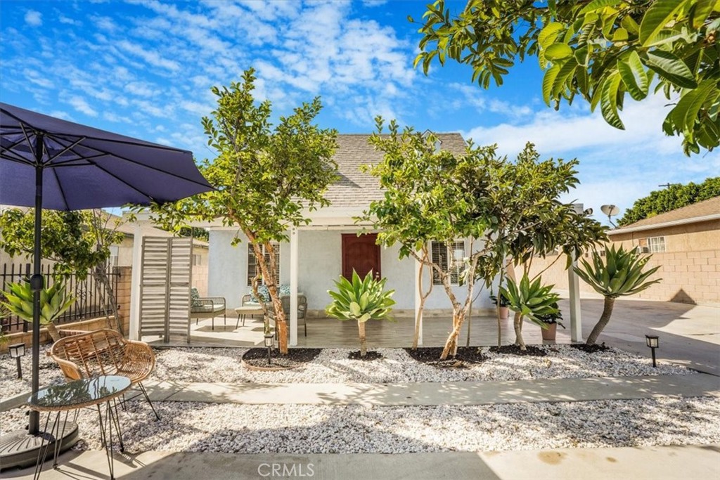 13737 Mercer Street Pacoima, CA 91331 - Photo 3 of 35 a view of a backyard with a patio